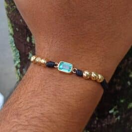 Pulsersa con piedra y balines de oro 18K