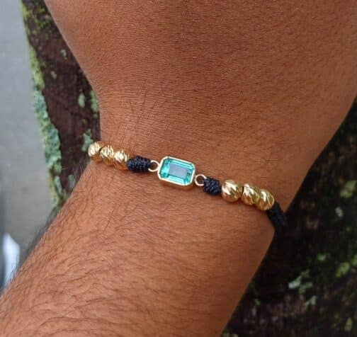 Pulsersa con piedra y balines de oro 18K